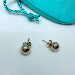 Tiffany & Co. 7.75 mm silver ball bead earrings.